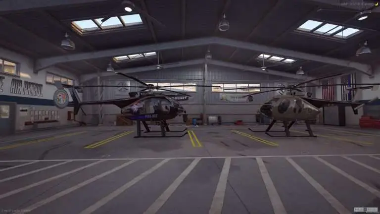 Vehicles lined up in a garage